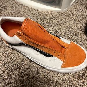 Men’s vans, never worn, whit orange and black. Size 10.
